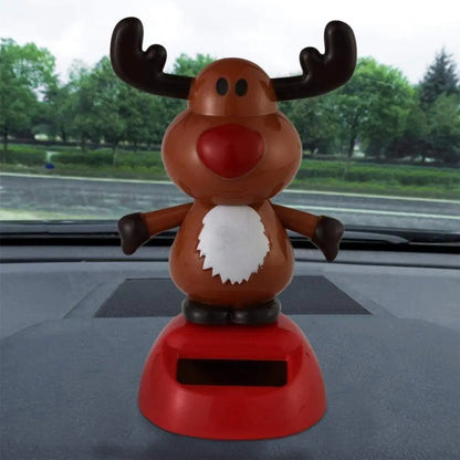 Juguete Bailarín Solar Figura Reno Pascuero Decorativa Móvil